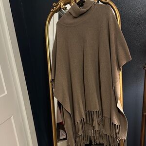 Cozy Brown Turtleneck Poncho with Fringe
